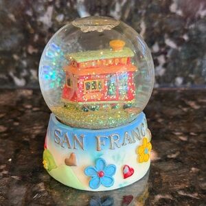 San Francisco Snow Globe with Cable Car with a discoloration on front glass